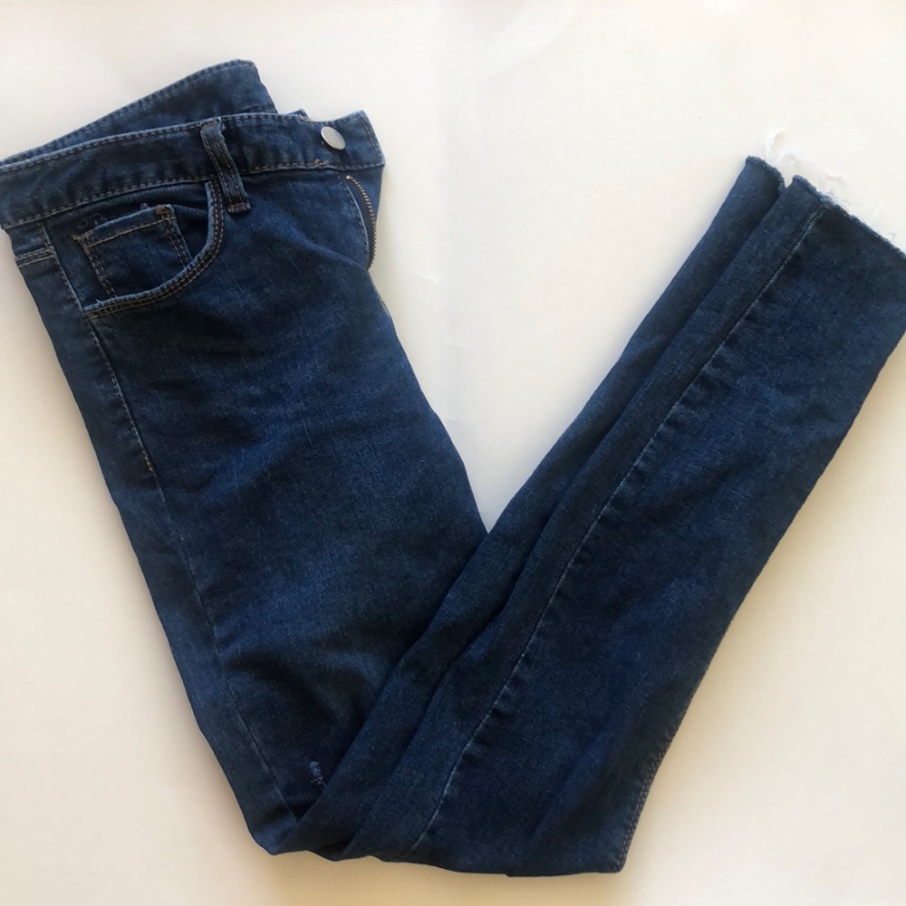 High waisted distressed jeans